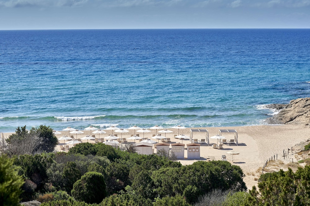 Baia di Chia Resort Sardinia, Curio Collection by Hilton — Beach in Domus de Maria, Sardinia
