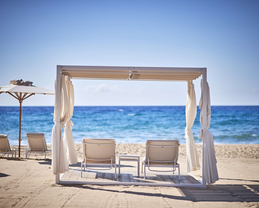 Baia di Chia Resort Sardinia, Curio Collection by Hilton — Beach in Domus de Maria, Sardinia