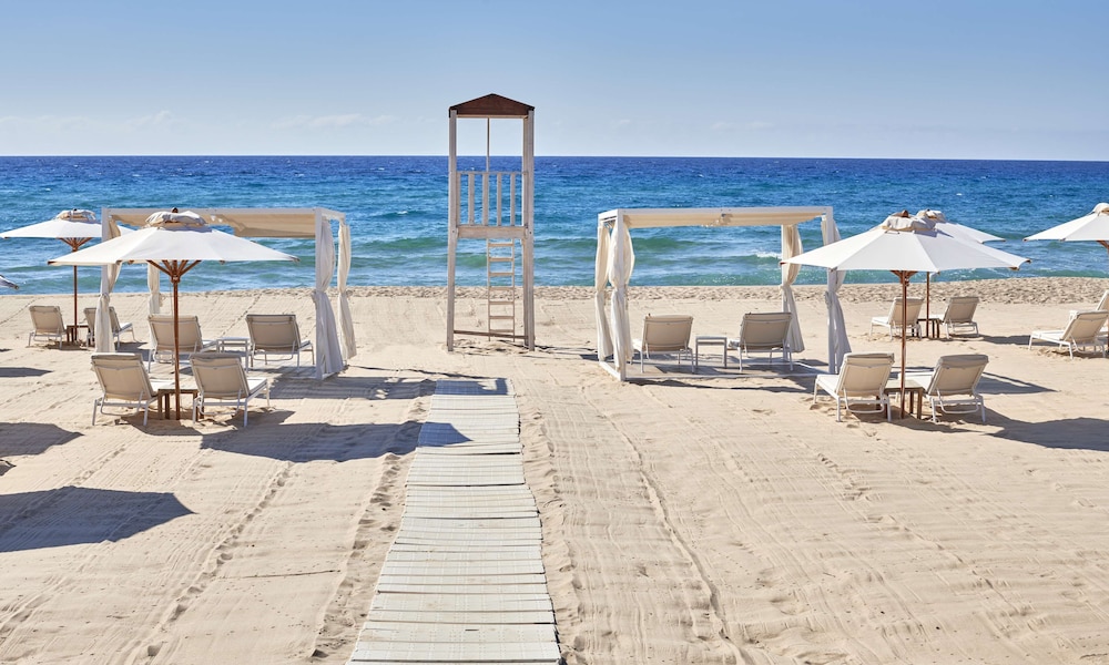 Baia di Chia Resort Sardinia, Curio Collection by Hilton — Beach in Domus de Maria, Sardinia