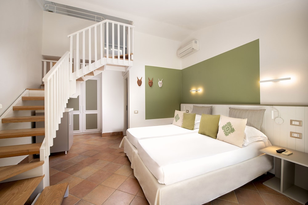 The Village - Chia Laguna Sardinia — Hotel rooms in Domus de Maria, Sardinia
