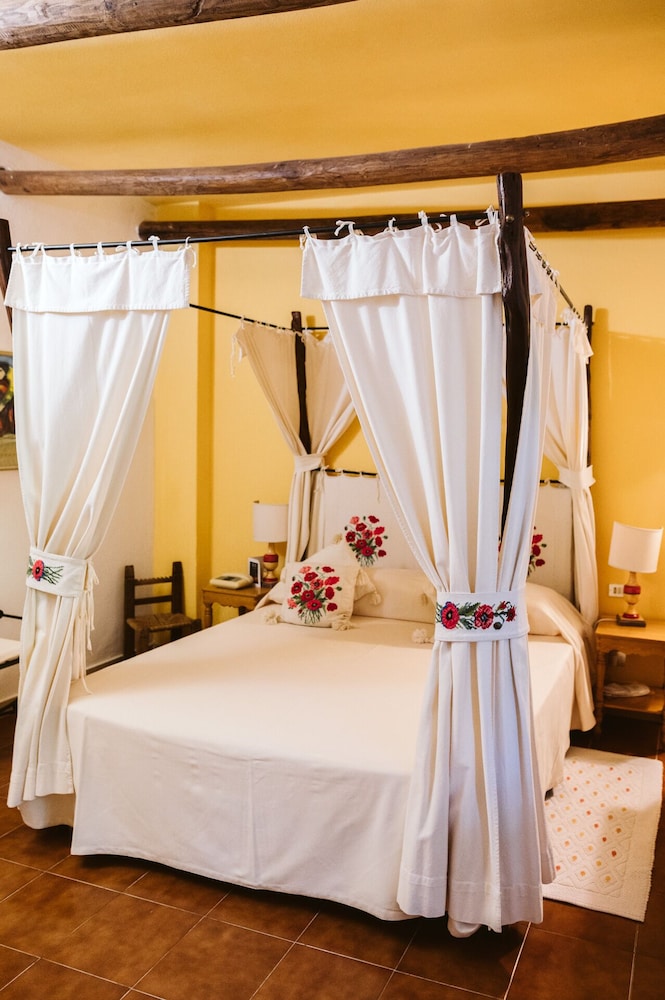 Su Gologone Experience Hotel — Hotel rooms in Oliena, Sardinia