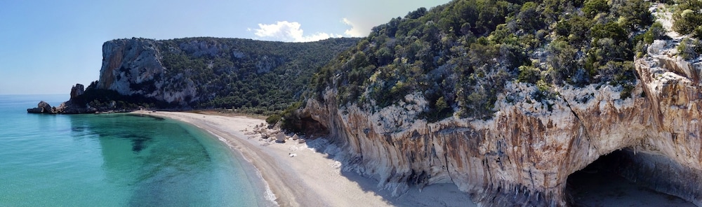 Su Gologone Experience Hotel — Beach in Oliena, Sardinia