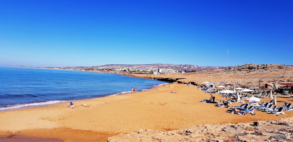 Helios Bay Hotel Apartments — Beach in Chlorakas, Paphos Region