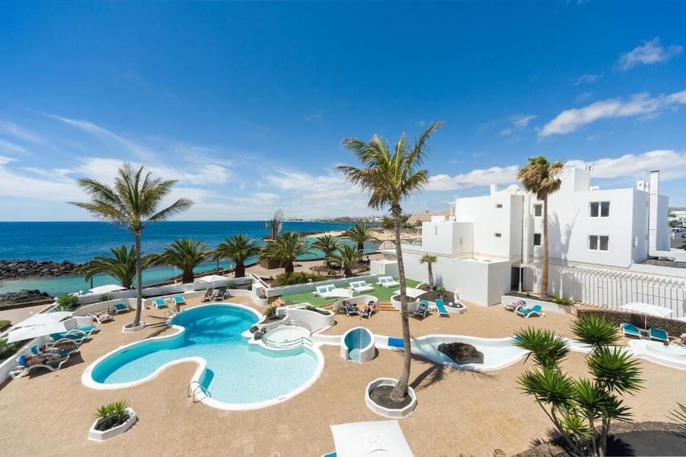 Neptuno Suites - Only Adults — Swimming pool in Costa Teguise, Canary Islands