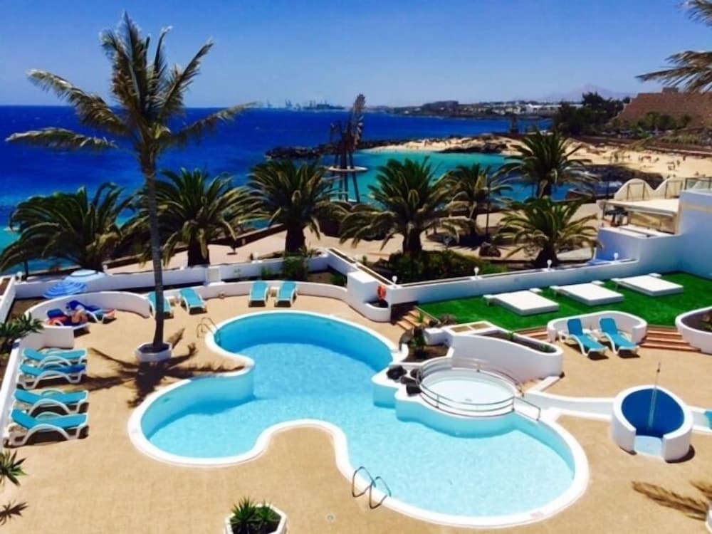 Neptuno Suites - Only Adults — Swimming pool in Costa Teguise, Canary Islands