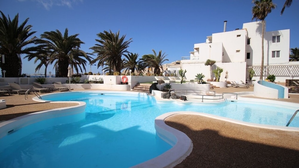 Neptuno Suites - Only Adults — Swimming pool in Costa Teguise, Canary Islands