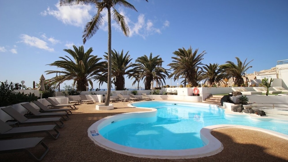 Neptuno Suites - Only Adults — Swimming pool in Costa Teguise, Canary Islands