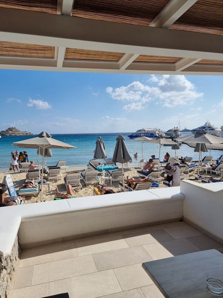 Acrogiali Beachfront Hotel — Beach in Plati Gialos, South Aegean