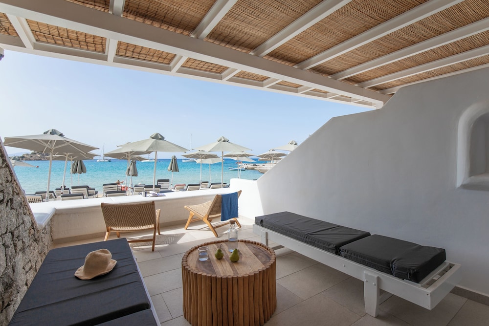 Acrogiali Beachfront Hotel — Beach in Plati Gialos, South Aegean