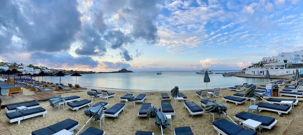 Acrogiali Beachfront Hotel — Beach in Plati Gialos, South Aegean