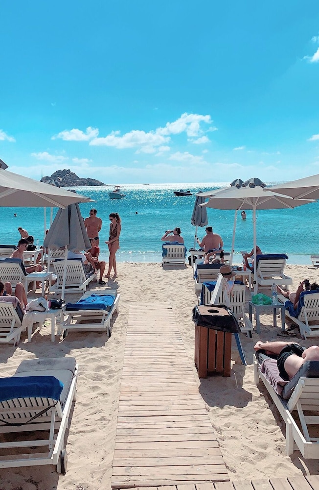 Acrogiali Beachfront Hotel — Beach in Plati Gialos, South Aegean