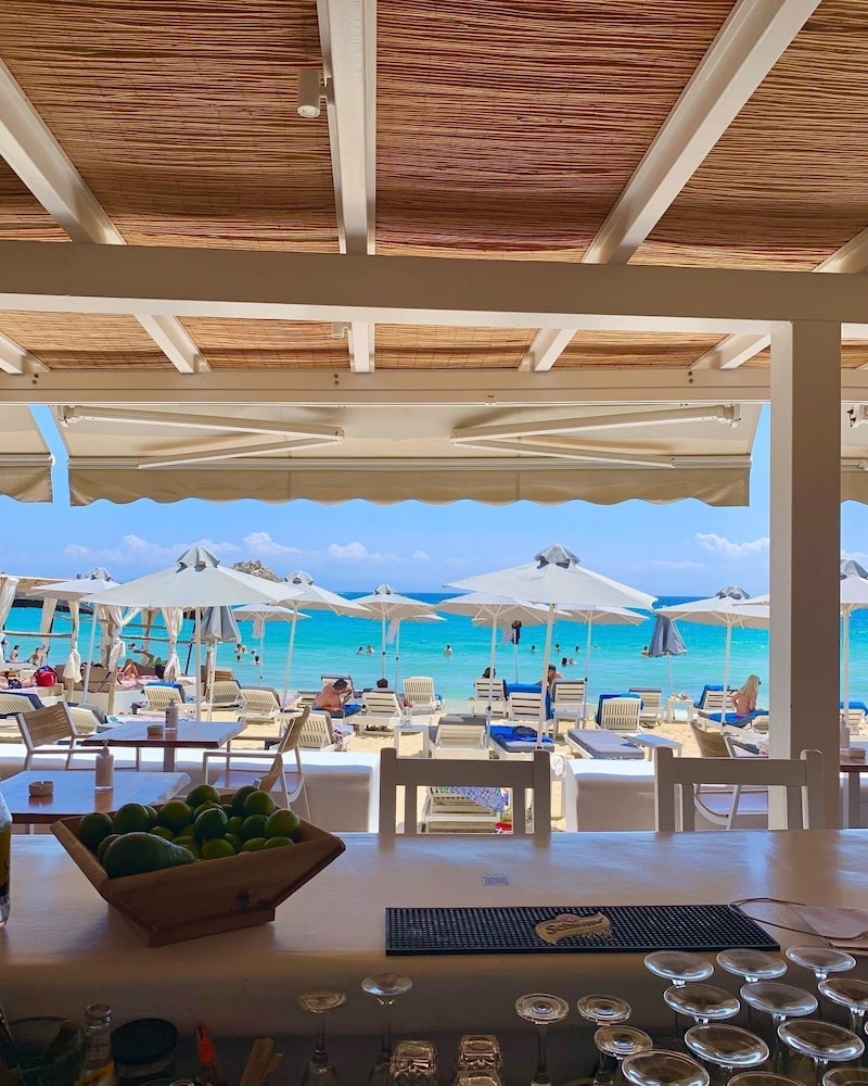 Acrogiali Beachfront Hotel — Beach in Plati Gialos, South Aegean