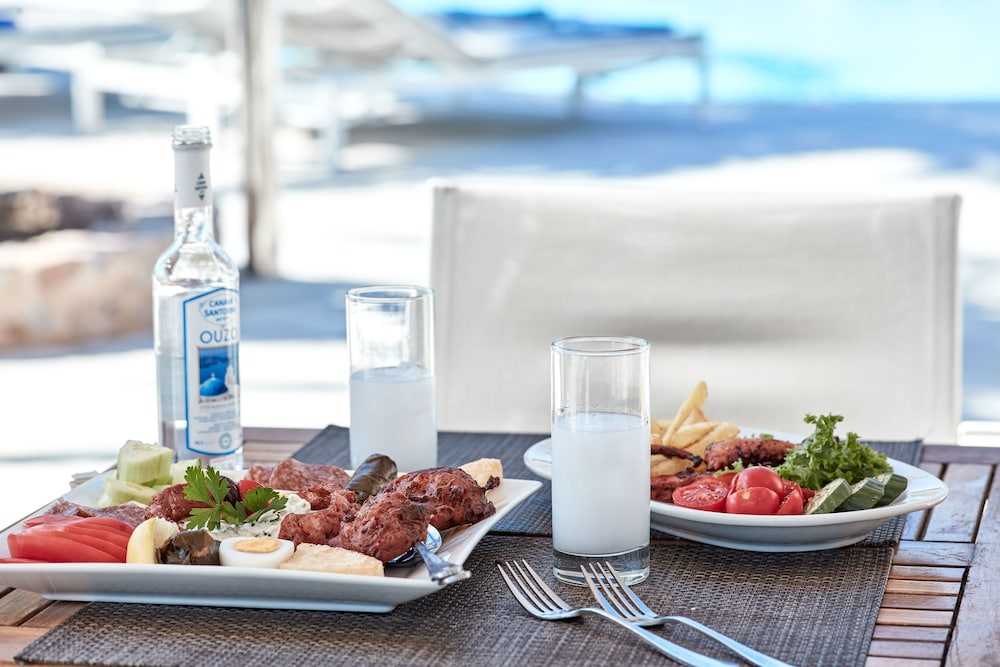 Santo Miramare Resort — Restaurant & bars in Aghios Georgios (Santorini), South Aegean