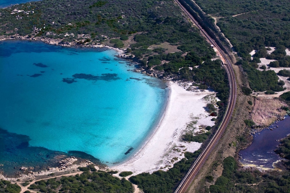 Gabbiano Azzurro Hotel & Suites — Beach in Golfo Aranci, Sardinia