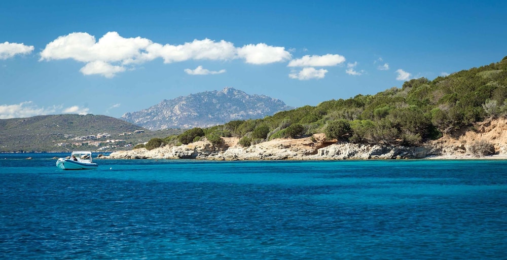 Gabbiano Azzurro Hotel & Suites — Beach in Golfo Aranci, Sardinia