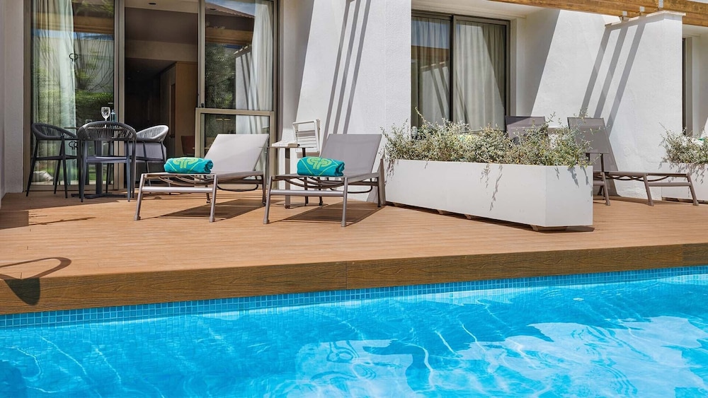 Protur Sa Coma Playa Hotel & Spa — Swimming pool in Sa Coma, Balearic Islands