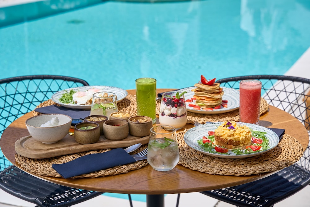 Adorno Beach Hotel & Suites — Restaurant & bars in Ornos, South Aegean