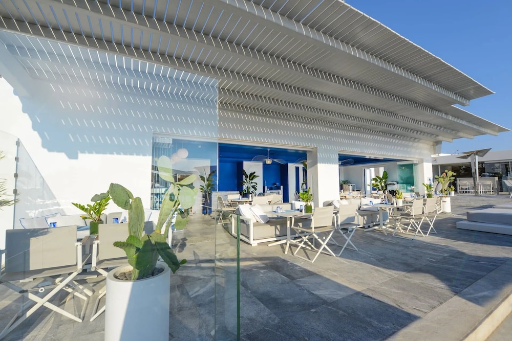 Mykonos Riviera Hotel & Spa a member of Small Luxury Hotels of the World — Restaurant & bars in Tourlos, South Aegean