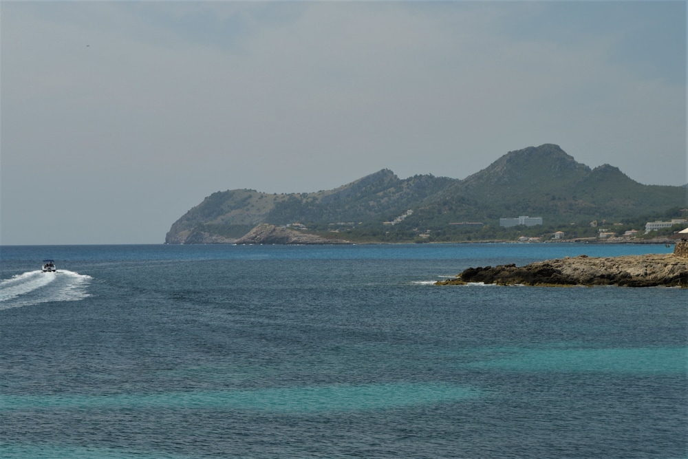 Hotel Amoros — Beach in Cala Ratjada, Balearic Islands
