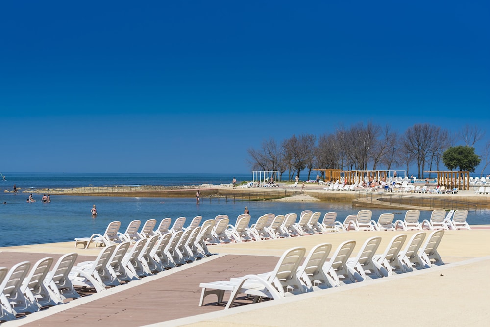 Apartments Polynesia Plava Laguna — Beach in Umag, Istria