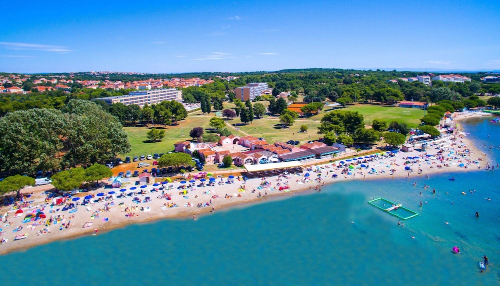 Ai Pini Medulin Resort — Beach in Medulin, Istria
