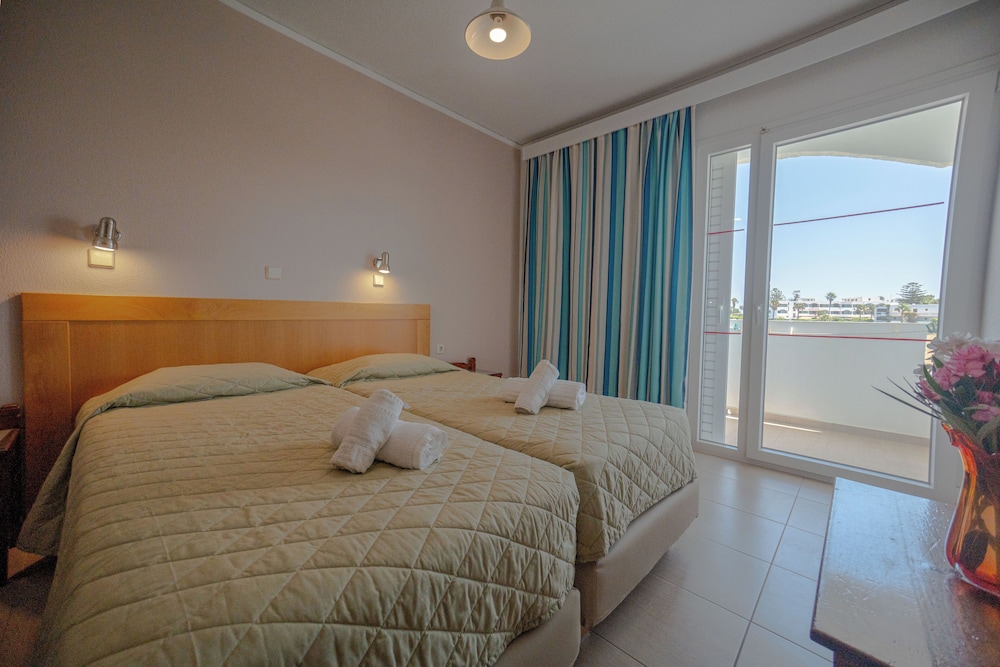 Tropical Sol — Hotel rooms in Tigaki, South Aegean