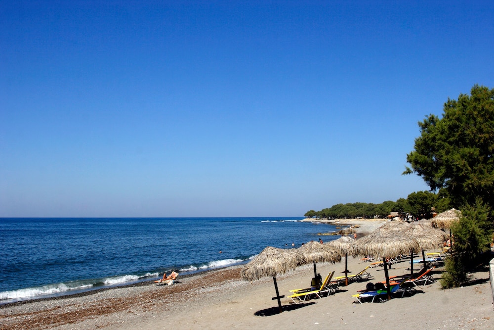 Theros Hotel — Beach in Platanias