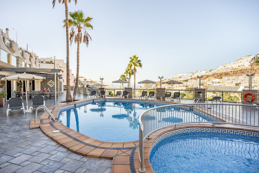Cala Nova Apartamentos — Swimming pool in Puerto Rico, Canary Islands