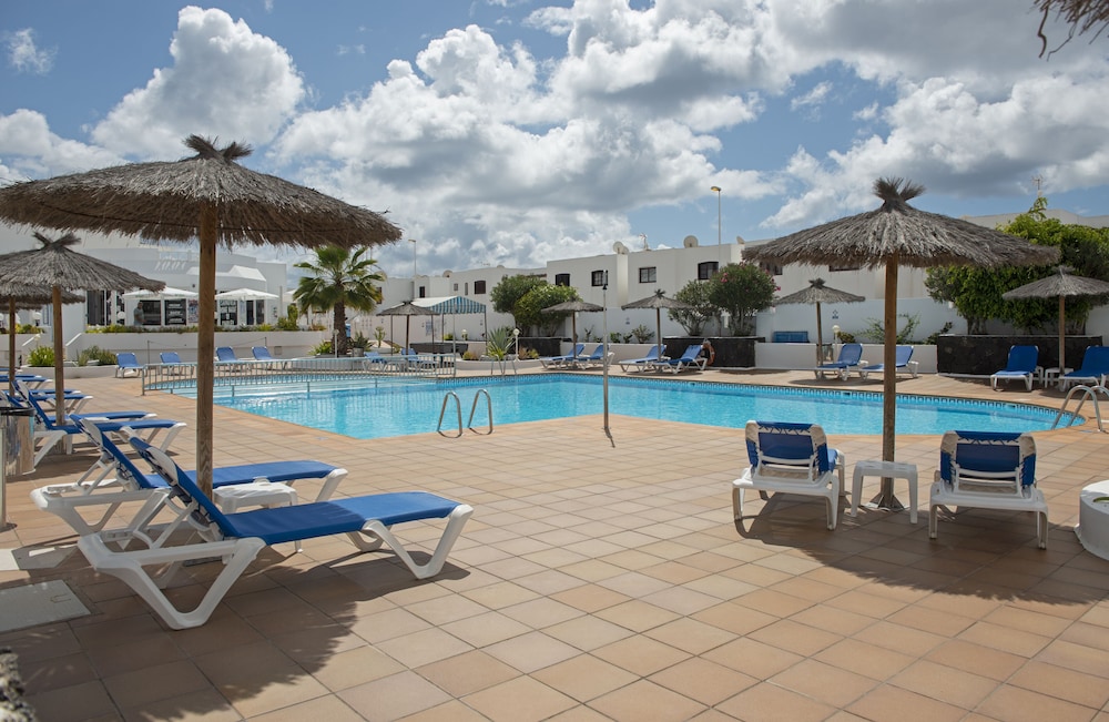 Apartamentos LIVVO Oasis — Swimming pool in Puerto del Carmen, Canary Islands