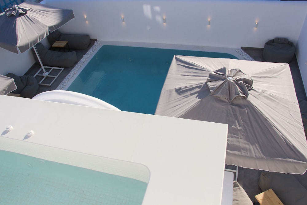 Emerald Collection Suites — Swimming pool in Karterados, South Aegean