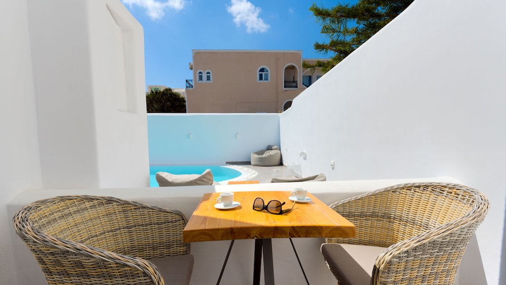 Emerald Collection Suites — Swimming pool in Karterados, South Aegean