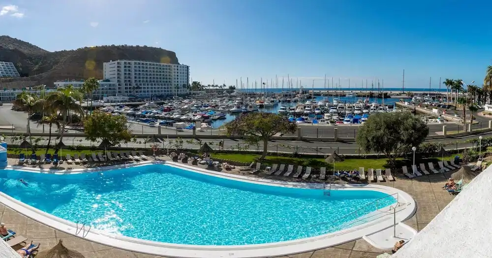 Apartamentos Portonovo — Swimming pool in Puerto Rico, Canary Islands