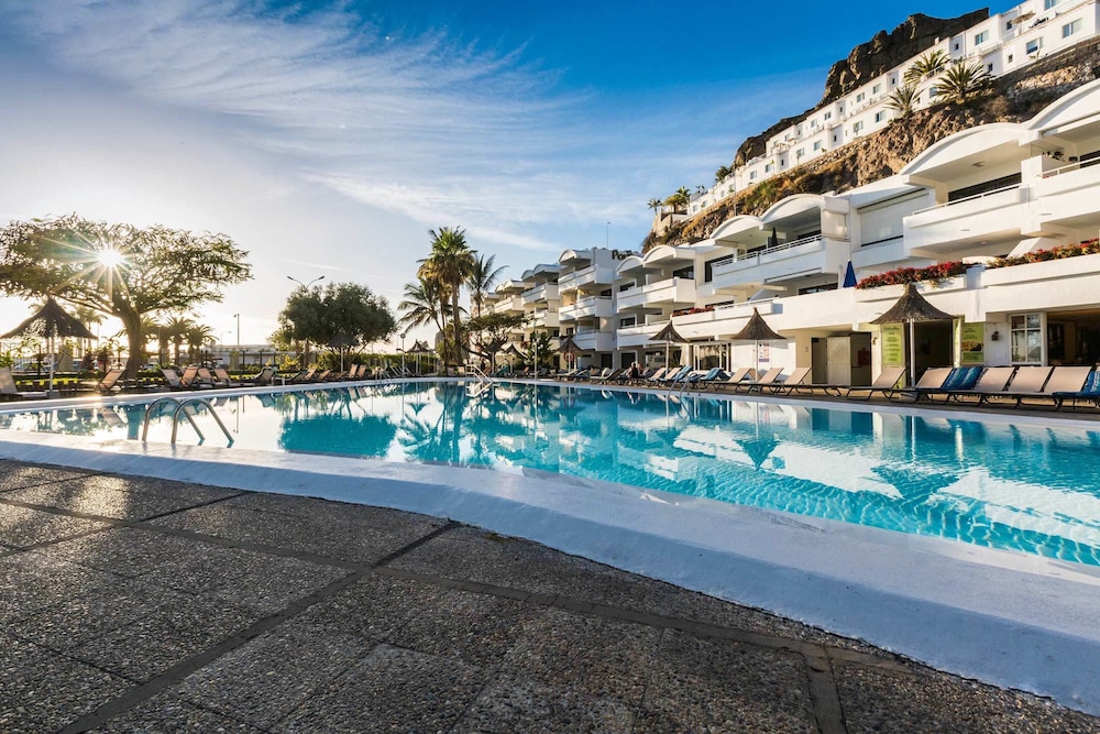 Apartamentos Portonovo — Swimming pool in Puerto Rico, Canary Islands