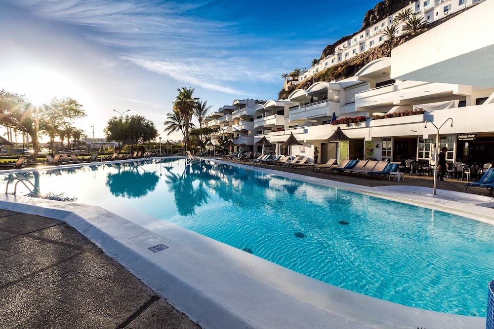 Apartamentos Portonovo — Swimming pool in Puerto Rico, Canary Islands