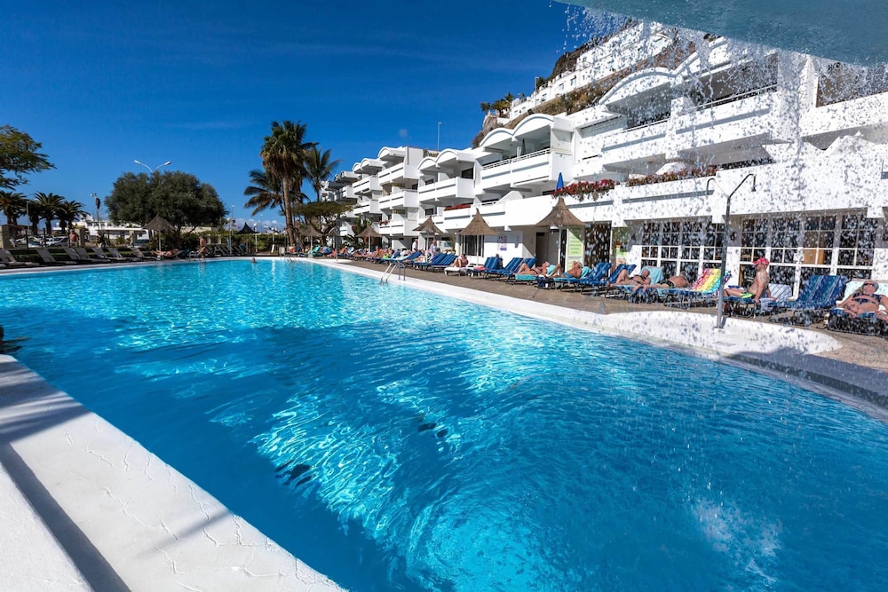 Apartamentos Portonovo — Swimming pool in Puerto Rico, Canary Islands