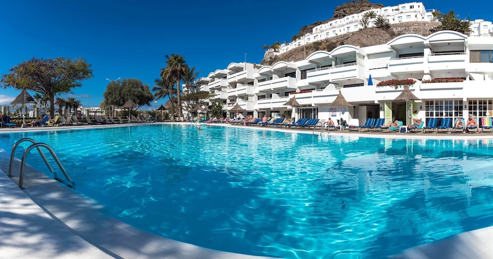 Apartamentos Portonovo — Swimming pool in Puerto Rico, Canary Islands