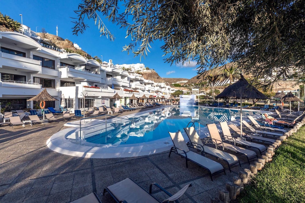 Apartamentos Portonovo — Swimming pool in Puerto Rico, Canary Islands