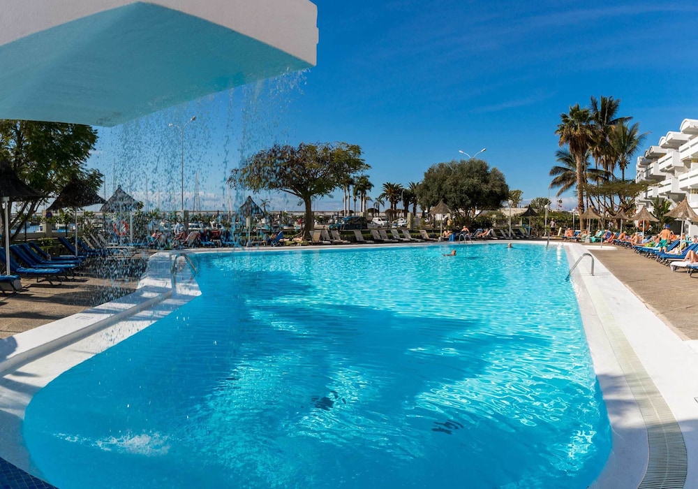 Apartamentos Portonovo — Swimming pool in Puerto Rico, Canary Islands