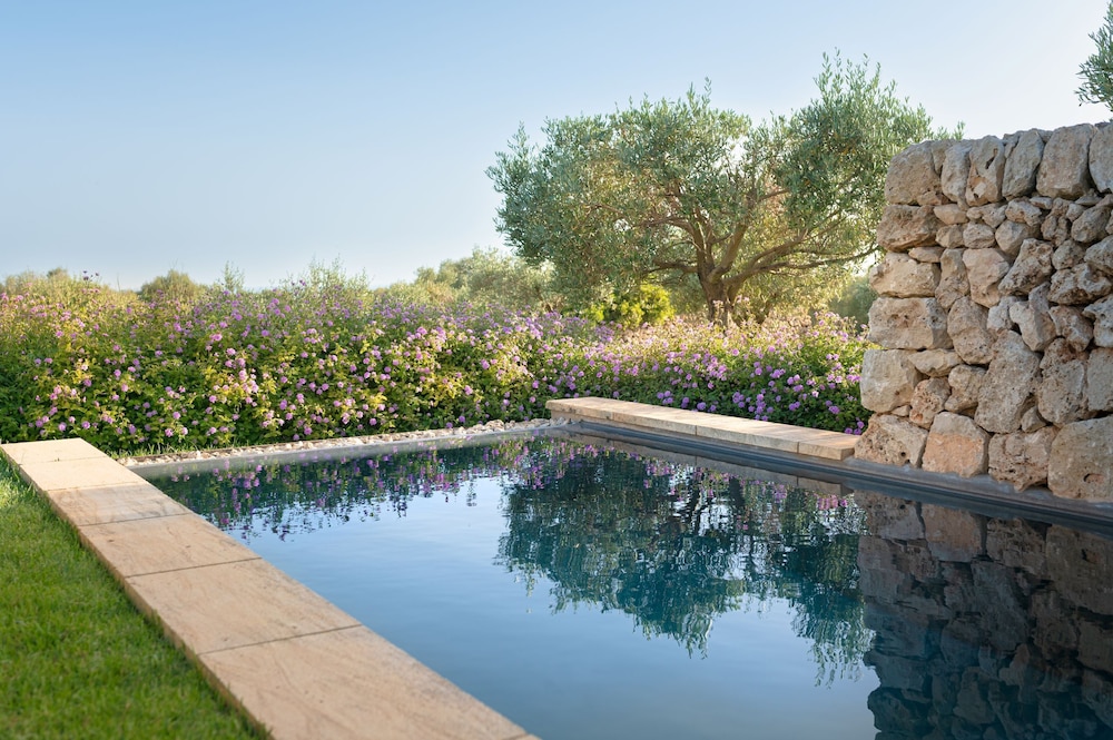 Torralbenc, a Small Luxury Hotel of the World — Swimming pool in Cala'n Porter, Balearic Islands