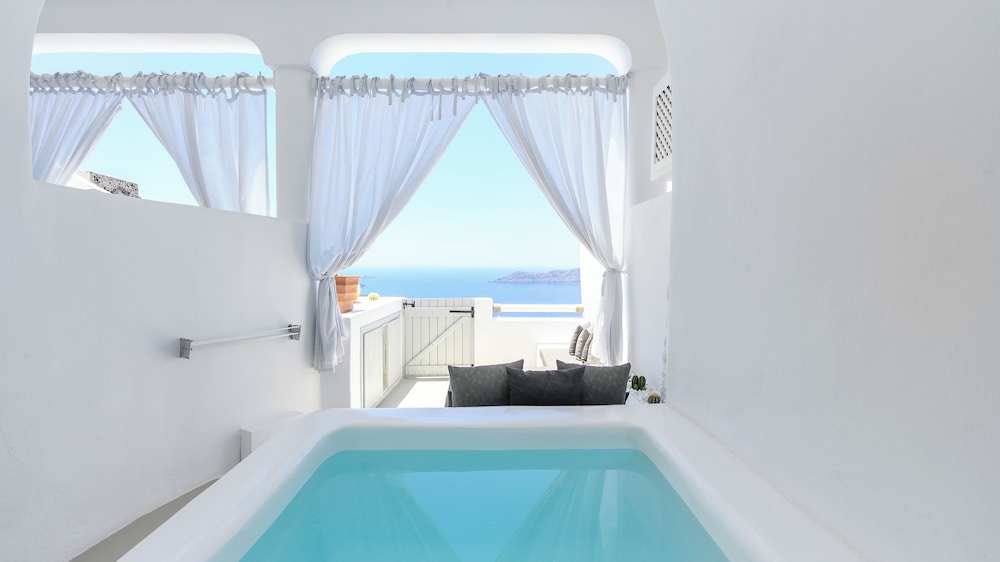 Hotel Sunny Villas — Hotel rooms in Imerovigli, South Aegean
