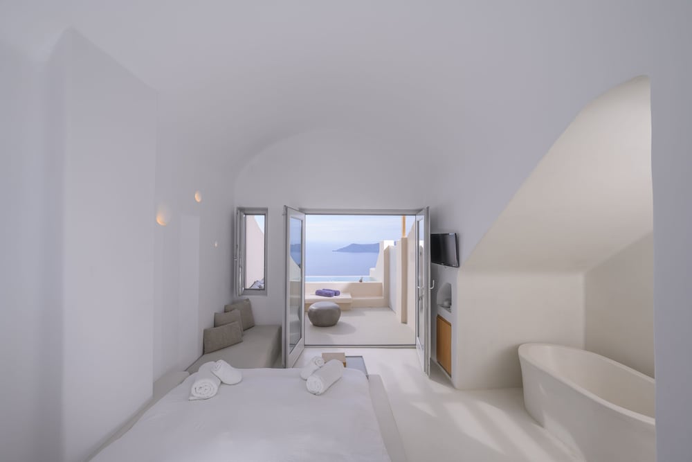 Hotel Sunny Villas — Hotel rooms in Imerovigli, South Aegean