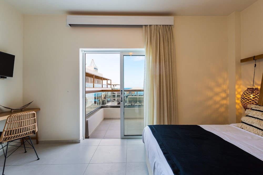 Nostos Beach Boutique Hotel — Hotel rooms in Bali