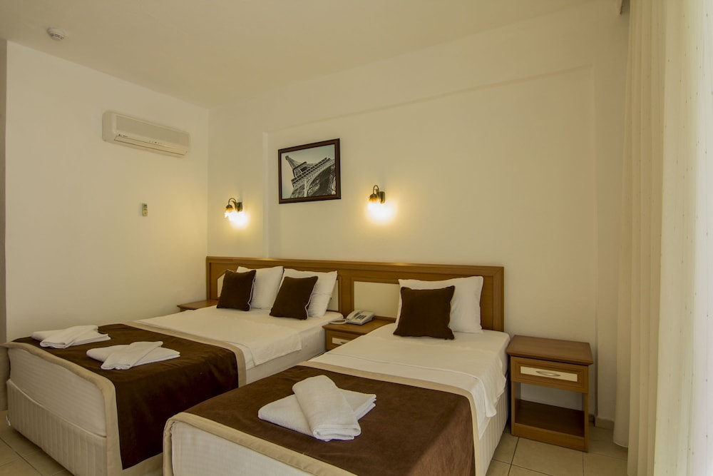 Belcekum Beach Hotel — Hotel rooms in Fethiye, Mugla