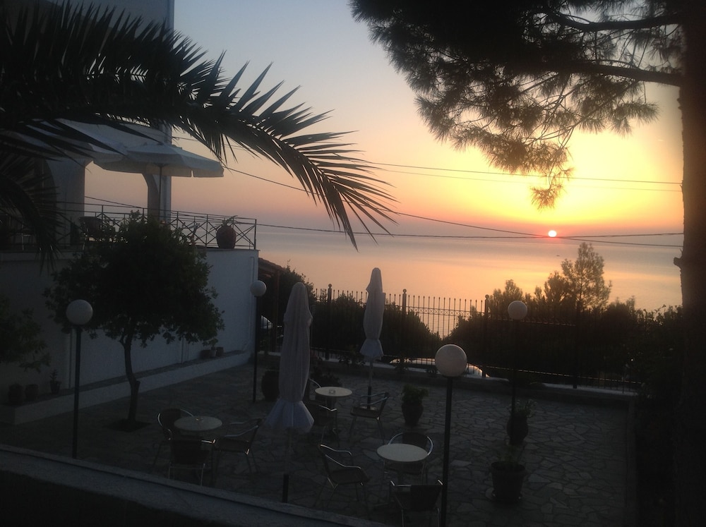 Travlos Studios — Restaurant & bars in Poros, Ionian Islands