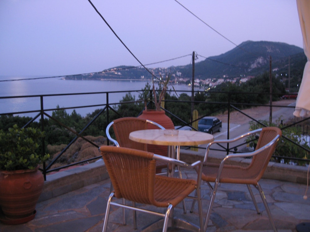 Travlos Studios — Restaurant & bars in Poros, Ionian Islands