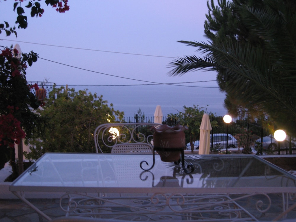Travlos Studios — Restaurant & bars in Poros, Ionian Islands