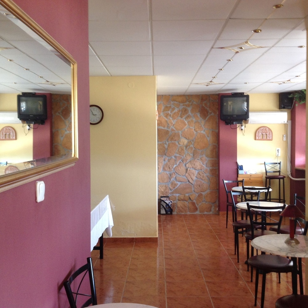 Travlos Studios — Restaurant & bars in Poros, Ionian Islands