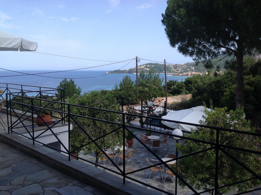 Travlos Studios — Restaurant & bars in Poros, Ionian Islands