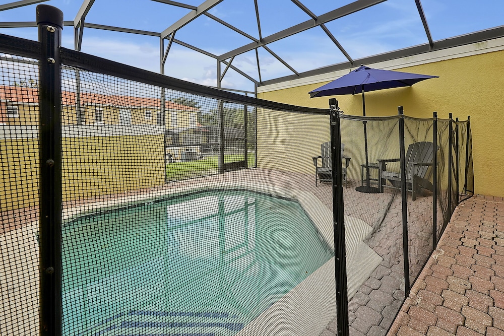 Vacation Townhomes by IDILIQ at Encantada Resort — Swimming pool in Kissimmee, Florida
