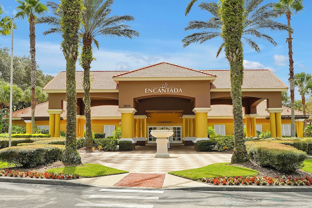 Vacation Townhomes by IDILIQ at Encantada Resort — Hotel building in Kissimmee, Florida